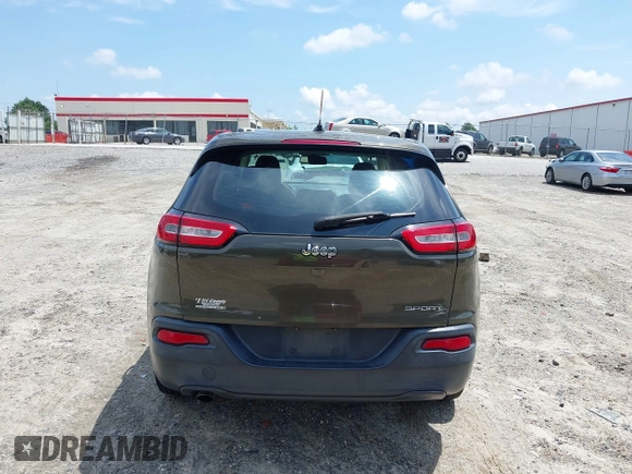 2015 Jeep Cherokee Sport with VIN 1C4PJLAB0FW660722, listed as a IAAI auction lot 42480650 with 272,396 mi miles and . Bid and sale history available at DreamBid. Image 16.