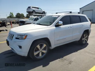2015 Jeep Grand Cherokee Overland with VIN 1C4RJFCM4FC618516, listed as a Copart auction lot 58671455 with 221,550 mi miles and Clean title. Bid and sale history available at DreamBid. Image 1.