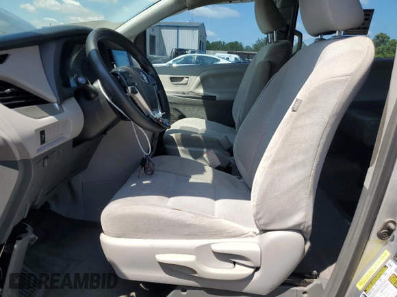 2018 Toyota Sienna L with VIN 5TDZZ3DCXJS928724, listed as a Copart auction lot 58067154 with 233,628 mi miles and Salvage Title. Bid and sale history available at DreamBid. Image 7.