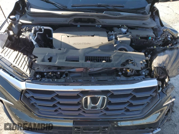 2025 Honda Pilot EX-L z VIN 5FNYG1H48SB083371, wystawiony jako Copart lot #49948825 z przebiegiem 4 772 mil mil oraz Szkoda całkowita • Salvage title. Historia ofert i sprzedaży dostępna na DreamBid. Obrazek 14.