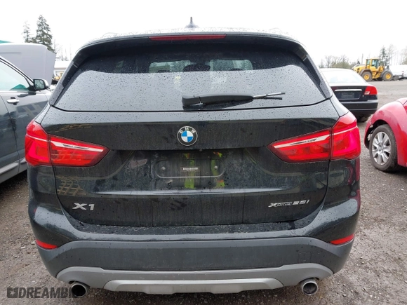 2018 BMW X1 xDrive28i with VIN WBXHT3C39J3H30531, listed as a IAAI auction lot 41890734 with 59,147 mi miles. Bid and sale history available at carsss.com. Image 17.