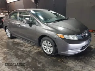 2012 Honda Civic LX z VIN 19XFB2F59CE373830, wystawiony jako IAAI lot #42312118 z przebiegiem 106 541 mil mil oraz . Historia ofert i sprzedaży dostępna na DreamBid. Obrazek 1.