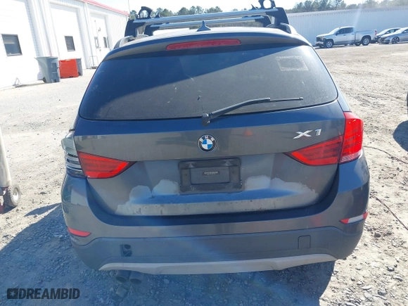 2014 BMW X1 sDrive28i with VIN WBAVM1C57EVW52502, listed as a IAAI auction lot 41702746 with 165,089 mi miles. Bid and sale history available at carsss.com. Image 16.