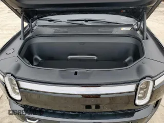 2024 Rivian R1S Adventure z VIN 7PDSGABAXRN035556, wystawiony jako Copart lot #59114065 z przebiegiem 9119 mil mil oraz Szkody całkowita. Historia ofert i sprzedaży dostępna na DreamBid. Obrazek 12.