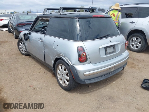 2004 MINI Hardtop with VIN WMWRC33434TJ57506, listed as a IAAI auction lot 42117581 with 148,483 mi miles and . Bid and sale history available at DreamBid. Image 3.