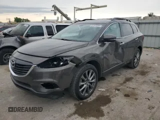2015 Mazda CX-9 Grand Touring with VIN JM3TB2DA0F0468350, listed as a Copart auction lot 61545095 with 154,050 mi miles and Salvage title. Bid and sale history available at DreamBid. Image 1.