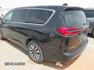 2023 Chrysler Pacifica Hybrid Touring L с VIN 2C4RC1L78PR551371, выставлен на аукционе IAAI как лот 42235410 с пробегом 49 519 миль миль и . История ставок и продаж доступна на DreamBid. Изображение 3.