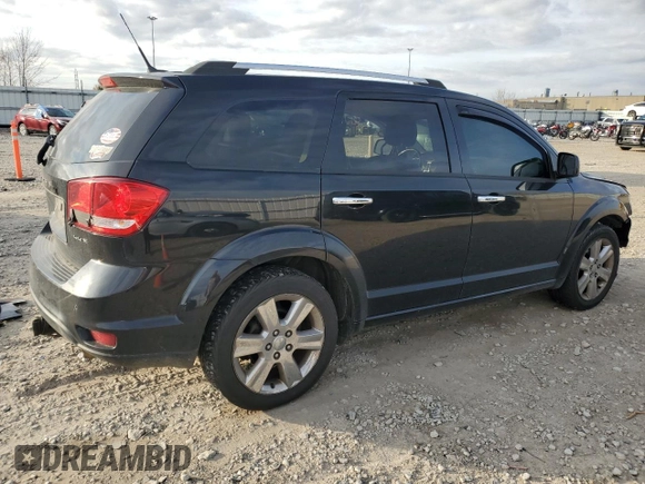 2011 Dodge Journey LUX with VIN 3D4PH9FG2BT535016, listed as a Copart auction lot 77885214 with 173,718 mi miles and Clean title. Bid and sale history available at DreamBid. Image 3.