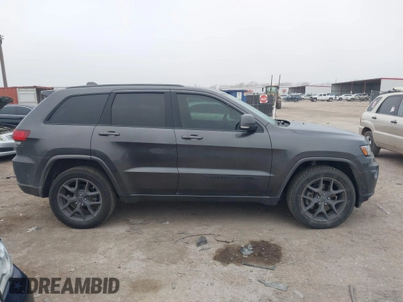 2021 Jeep Grand Cherokee 80th Anniversary z VIN 1C4RJFBGXMC621817, wystawiony jako IAAI lot #41519733 z przebiegiem 60 552 mil mil oraz . Historia ofert i sprzedaży dostępna na DreamBid. Obrazek 13.