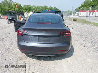 2023 Tesla Model 3 with VIN 5YJ3E1EA2PF566047, listed as a IAAI auction lot 42481008 with 21,143 mi miles and . Bid and sale history available at DreamBid. Image 16.
