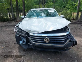 2021 Volkswagen Passat SE with VIN 1VWSA7A38MC014396, listed as a IAAI auction lot 42201818 with 62,193 mi miles and . Bid and sale history available at DreamBid. Image 13.