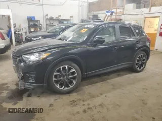 2016 Mazda CX-5 Grand Touring with VIN JM3KE4DY0G0854568, listed as a Copart auction lot 53259345 with 74,264 mi miles and Salvage Title. Bid and sale history available at carsss.com. Image 1.