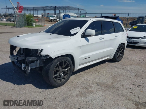 2020 Jeep Grand Cherokee Trackhawk with VIN 1C4RJFN96LC141513, listed as a IAAI auction lot 42386219 with Not provided miles and . Bid and sale history available at DreamBid. Image 2.