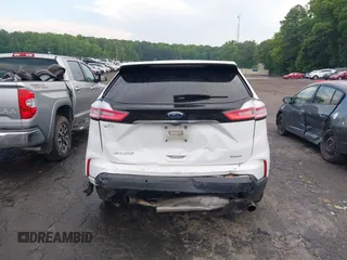 2020 Ford Edge SE z VIN 2FMPK3G91LBB28034, wystawiony jako IAAI lot #42256654 z przebiegiem 95 997 mil mil oraz . Historia ofert i sprzedaży dostępna na DreamBid. Obrazek 16.
