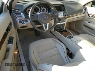 2016 Mercedes-Benz E 400 with VIN WDDKK6FF8GF334288, listed as a Copart auction lot 77405814 with 115,728 mi miles and Salvage Title. Bid and sale history available at carsss.com. Image 8.