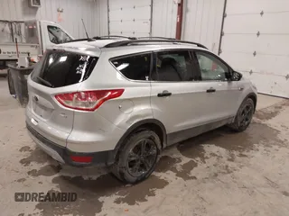 2014 Ford Escape SE z VIN 1FMCU9GX1EUD67624, wystawiony jako IAAI lot #41986362 z przebiegiem 79 921 mil mil oraz . Historia ofert i sprzedaży dostępna na DreamBid. Obrazek 4.