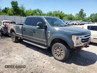 2021 Ford F-350 XL with VIN 1FT8W3BT1MEC69708, listed as a Copart auction lot 56928725 with 106,637 mi miles and Salvage title. Bid and sale history available at DreamBid. Image 4.