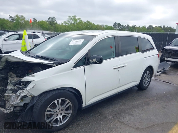 2012 Honda Odyssey EX-L with VIN 5FNRL5H60CB134954, listed as a IAAI auction lot 41942488 with 192,069 mi miles and . Bid and sale history available at DreamBid. Image 2.