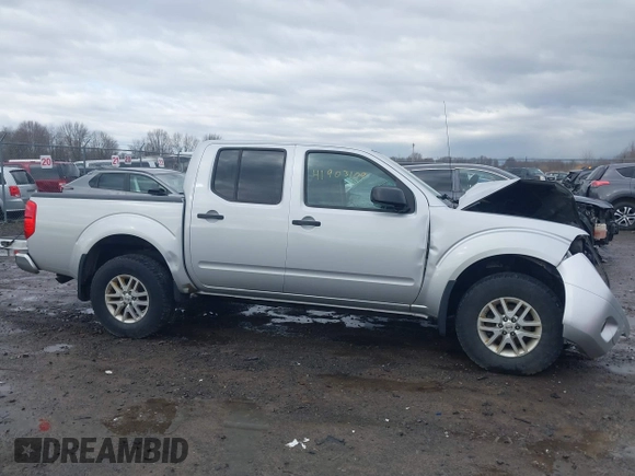 2018 Nissan Frontier Pro-4X with VIN 1N6AD0EV4JN737409, listed as a IAAI auction lot 41903169 with 145,479 mi miles and . Bid and sale history available at DreamBid. Image 14.