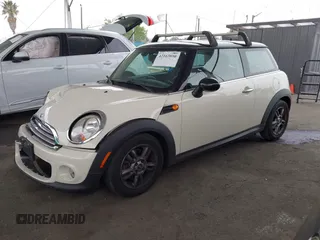 2013 MINI Hardtop with VIN WMWSU3C53DT684999, listed as a IAAI auction lot 42163800 with 89,774 mi miles and . Bid and sale history available at DreamBid. Image 2.