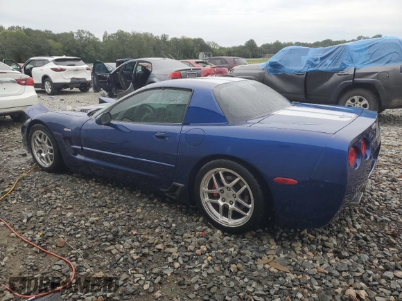 2004 Chevrolet Corvette Z06 with VIN 1G1YY12S045130166, listed as a Copart auction lot 74200864 with 69,691 mi miles and Salvage Title. Bid and sale history available at carsss.com. Image 2.