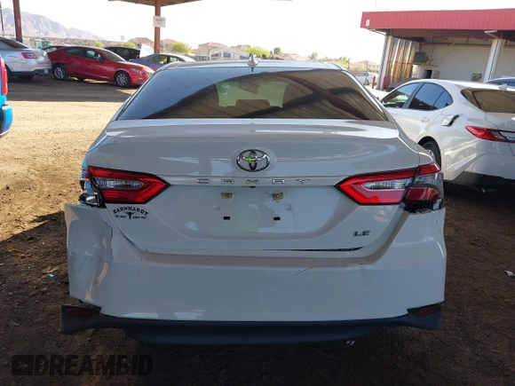 2020 Toyota Camry LE with VIN 4T1C11AK7LU401666, listed as a IAAI auction lot 41865235 with 69,189 mi miles. Bid and sale history available at carsss.com. Image 16.