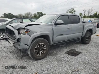 2020 Toyota Tacoma SR5 with VIN 3TMAZ5CNXLM121344, listed as a Copart auction lot 59393395 with 69,902 mi miles and Salvage title. Bid and sale history available at DreamBid. Image 1.