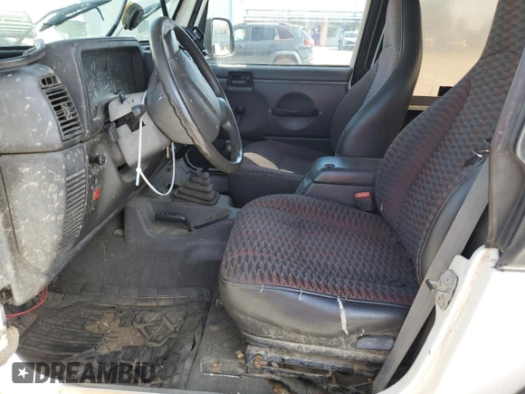 1999 Jeep Wrangler Sport with VIN 1J4FY19SXXP464096, listed as a Copart auction lot 61233105 with 167,350 mi miles and Clean title. Bid and sale history available at DreamBid. Image 7.