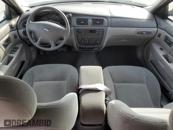 2003 Ford Taurus LX Standard z VIN 1FAFP52U93A159333, wystawiony jako Copart lot #78080944 z przebiegiem 54 652 mil mil oraz Szkoda całkowita • Salvage title. Historia ofert i sprzedaży dostępna na DreamBid. Obrazek 8.