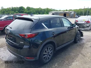 2018 Mazda CX-5 Grand Touring z VIN JM3KFBDM5J0307785, wystawiony jako IAAI lot #42302609 z przebiegiem 81 974 mil mil oraz . Historia ofert i sprzedaży dostępna na DreamBid. Obrazek 4.