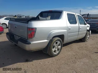 2014 Honda Ridgeline RTL with VIN 5FPYK1F5XEB008421, listed as a IAAI auction lot 41266050 with 86,490 mi miles. Bid and sale history available at carsss.com. Image 4.