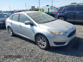 2017 Ford Focus SE with VIN 1FADP3F2XHL304413, listed as a IAAI auction lot 41939334 with 106,074 mi miles and . Bid and sale history available at DreamBid. Image 1.