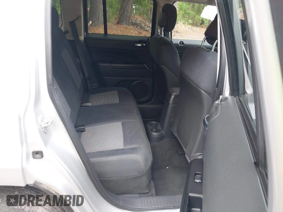2011 Jeep Patriot Sport with VIN 1J4NF1GB0BD281031, listed as a IAAI auction lot 42203317 with 174,240 mi miles. Bid and sale history available at carsss.com. Image 8.