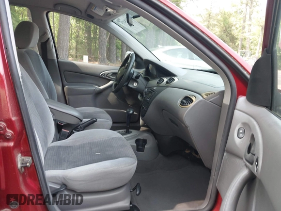 2003 Ford Focus SE Fleet z VIN 1FAFP36333W157750, wystawiony jako IAAI lot #42418479 z przebiegiem 73 273 mil mil oraz . Historia ofert i sprzedaży dostępna na DreamBid. Obrazek 5.