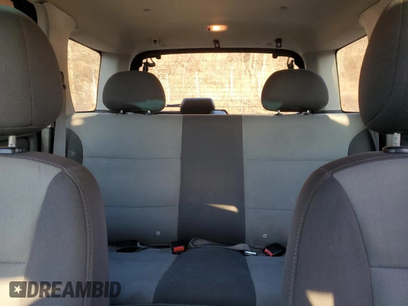 2004 Ford Escape XLS with VIN 1FMCU92134KB88319, listed as a Copart auction lot 84243494 with 158,052 mi miles and Salvage Title. Bid and sale history available at DreamBid. Image 10.