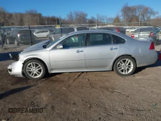 2013 Chevrolet Impala LTZ with VIN 2G1WC5E31D1190461, listed as a IAAI auction lot 41381242 with 205,833 mi miles and . Bid and sale history available at DreamBid. Image 14.