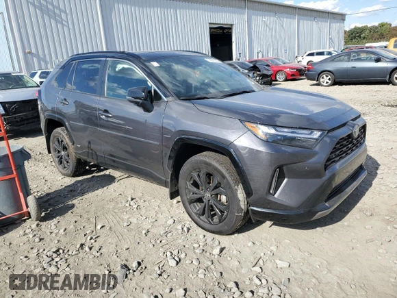 2023 Toyota RAV4 Hybrid XSE with VIN 4T3E6RFV1PU112579, listed as a Copart auction lot 74387924 with 103,340 mi miles and Salvage title. Bid and sale history available at DreamBid. Image 4.