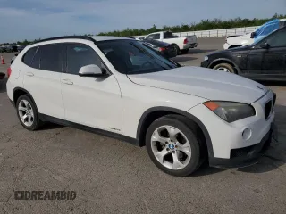 2015 BMW X1 sDrive28i with VIN WBAVM1C58FVZ93621, listed as a Copart auction lot 49897325 with 72,884 mi miles and Salvage Title. Bid and sale history available at carsss.com. Image 4.