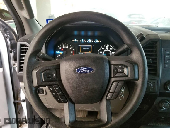 2019 Ford F-150 XL with VIN 1FTFW1E54KKE85396, listed as a IAAI auction lot 42174957 with 126,732 mi miles. Bid and sale history available at carsss.com. Image 1.