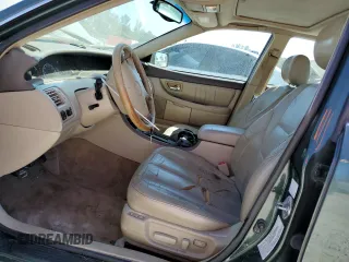 2001 Toyota Avalon XL with VIN 4T1BF28B21U116895, listed as a Copart auction lot 48507255 with 211,361 mi miles and Salvage Title. Bid and sale history available at DreamBid. Image 7.