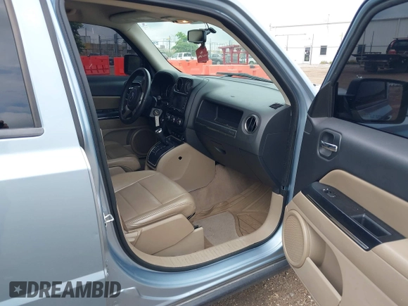 2013 Jeep Patriot Limited with VIN 1C4NJRCB7DD228595, listed as a IAAI auction lot 42537471 with 122,987 mi miles and . Bid and sale history available at DreamBid. Image 5.