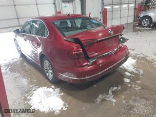 2017 Volkswagen Passat 1.8T S with VIN 1VWAT7A33HC039279, listed as a IAAI auction lot 40902796 with 143,730 mi miles. Bid and sale history available at carsss.com. Image 3.