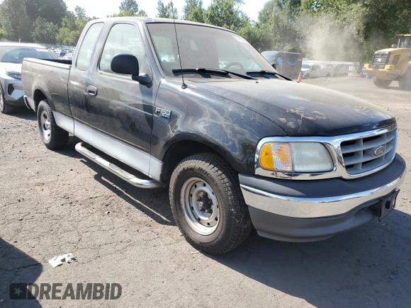 2003 Ford F-150 XL with VIN 2FTRX17293CA94389, listed as a Copart auction lot 65462825 with 165,638 mi miles and Clean title. Bid and sale history available at DreamBid. Image 4.