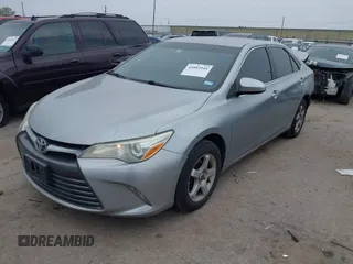 2015 Toyota Camry XLE with VIN 4T4BF1FKXFR472201, listed as a IAAI auction lot 41883944 with 143,296 mi miles and . Bid and sale history available at DreamBid. Image 2.