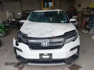 2019 Honda Pilot Elite with VIN 5FNYF6H08KB054725, listed as a IAAI auction lot 40496860 with 91,284 mi miles and . Bid and sale history available at DreamBid. Image 13.