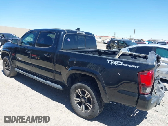 2018 Toyota Tacoma SR5 with VIN 3TMBZ5DN1JM014540, listed as a IAAI auction lot 42505324 with 112,990 mi miles and . Bid and sale history available at DreamBid. Image 3.
