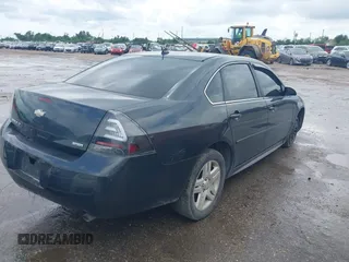 2015 Chevrolet Impala LT with VIN 2G1WB5E33F1164692, listed as a IAAI auction lot 42062791 with 129,022 mi miles and . Bid and sale history available at DreamBid. Image 4.