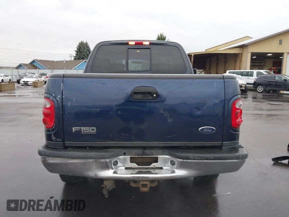 2003 Ford F-150 XLT with VIN 1FTRW08L33KC62060, listed as a IAAI auction lot 41618936 with 276,251 mi miles. Bid and sale history available at carsss.com. Image 16.
