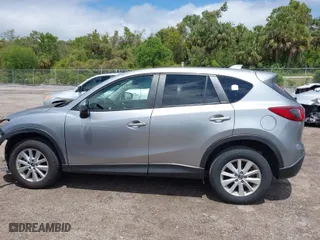 2014 Mazda CX-5 Touring with VIN JM3KE2CY4E0357445, listed as a IAAI auction lot 41967334 with 115,535 mi miles. Bid and sale history available at carsss.com. Image 15.