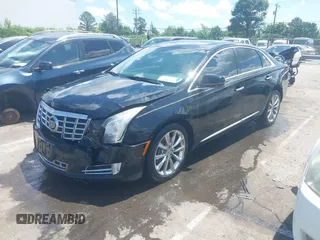 2013 Cadillac XTS Luxury z VIN 2G61P5S37D9101989, wystawiony jako IAAI lot #42242641 z przebiegiem 243 006 mil mil oraz . Historia ofert i sprzedaży dostępna na DreamBid. Obrazek 17.